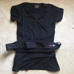 Nuroo baby wearing shirt, EUC